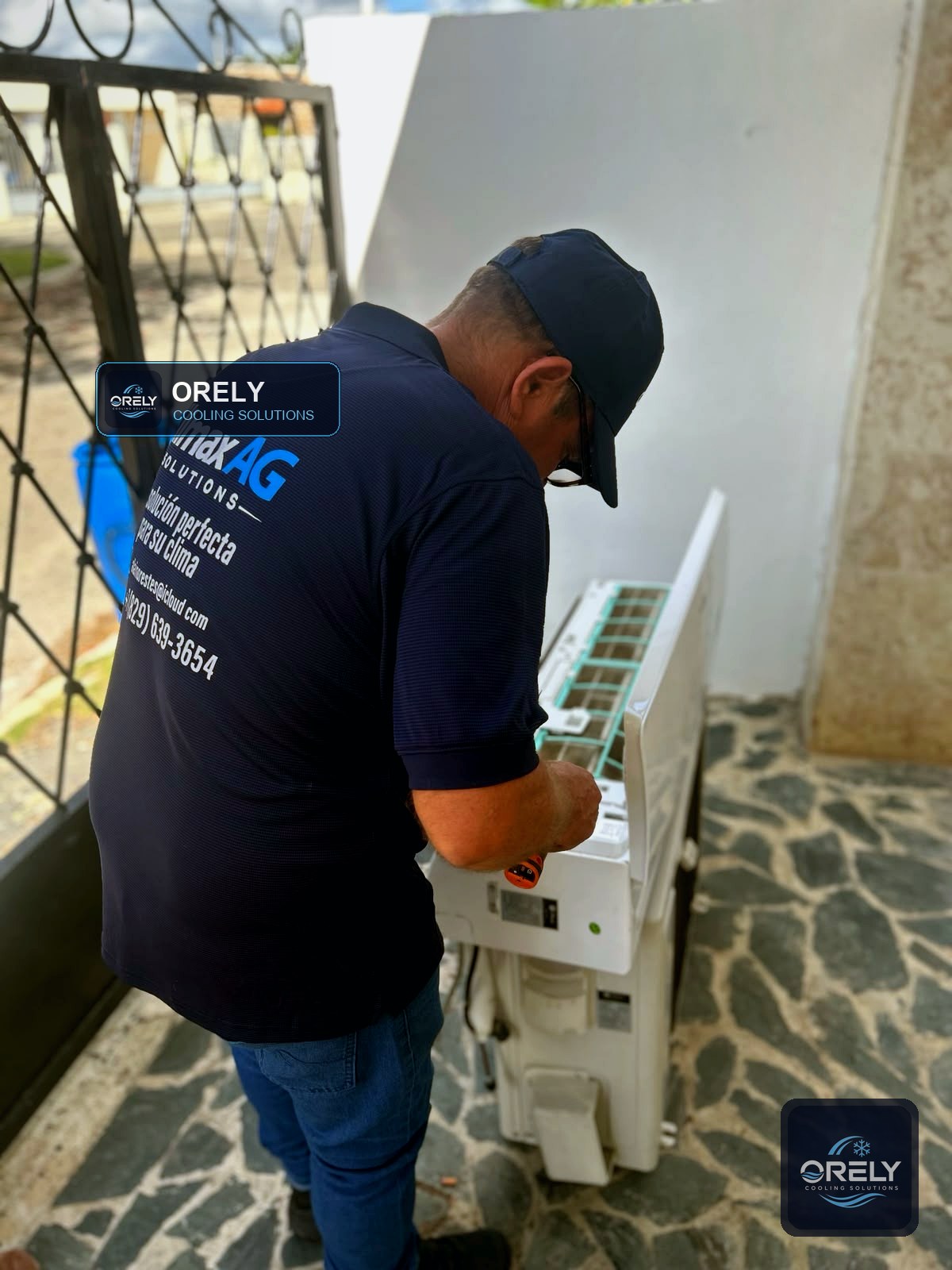 Technician working on an air conditioning system